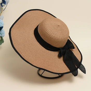 جديد الصيف النساء الطاقية قبعة الشاطئ عارضة الإناث قبعة بنما سيدة الكلاسيكية شقة Bowknot القش قبعة الشمس هدية المرأة